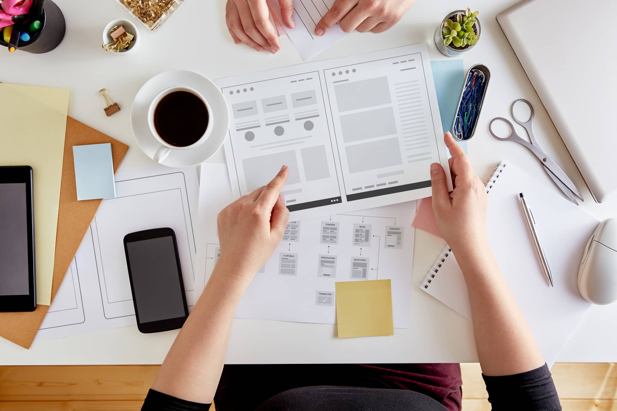 person at a desk looking at papers