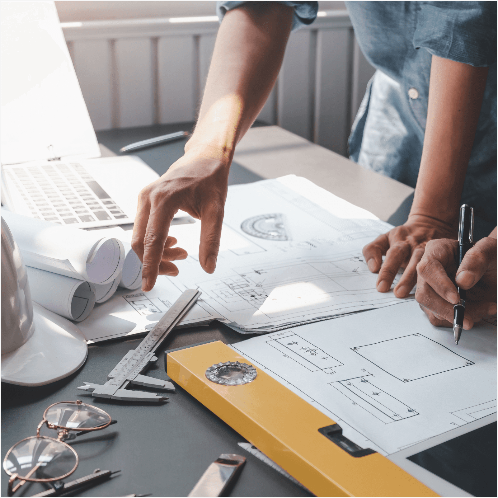 People looking at floor plans