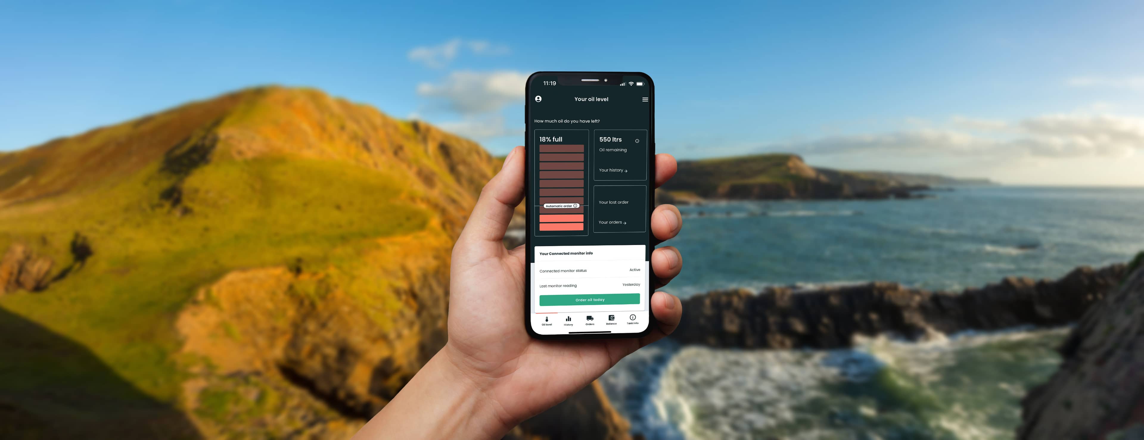 Boiler Juice App being used by man holding an iPhone