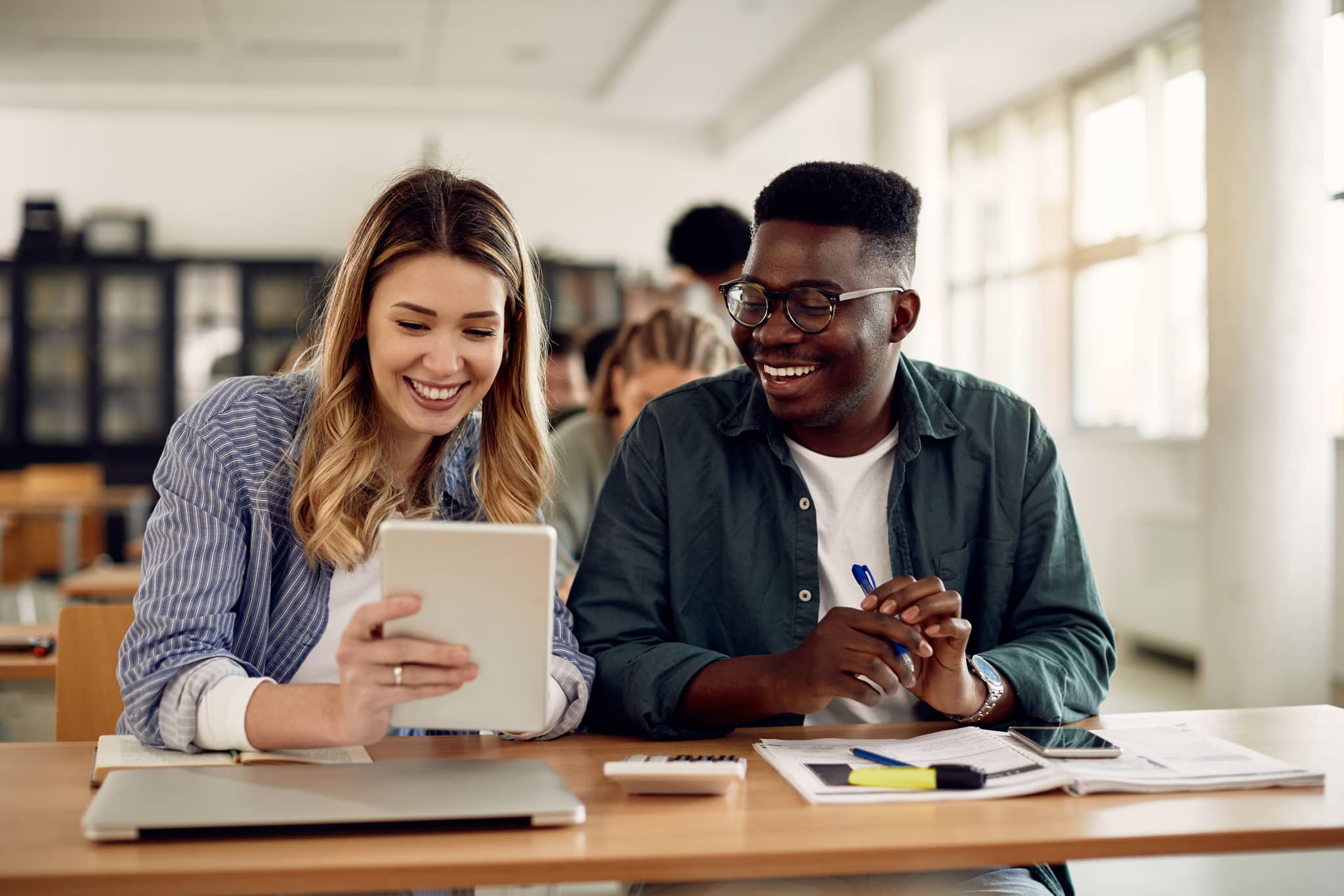 Two people studying