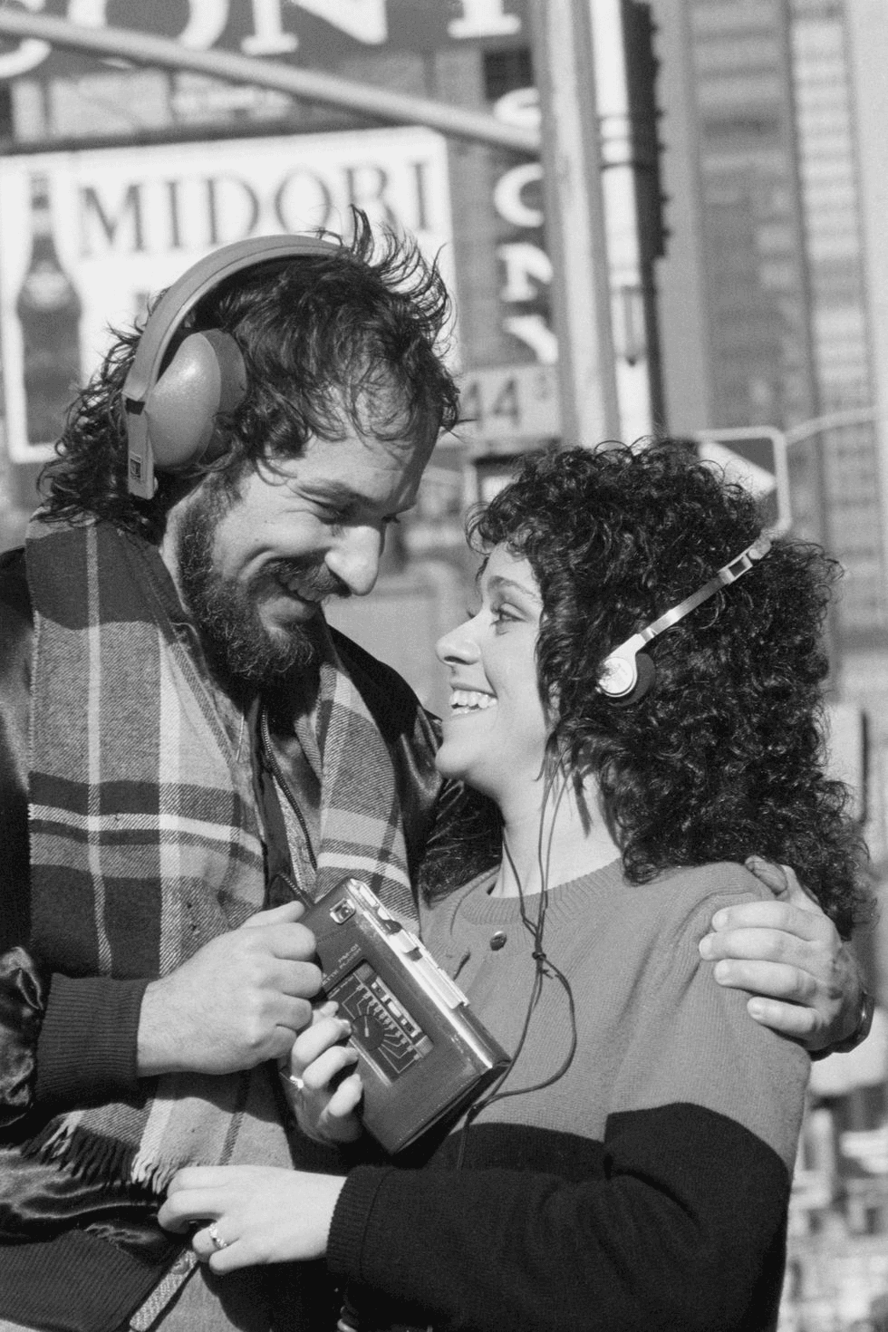 Couple using a Sony Walkman