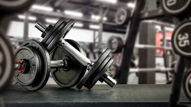 Gym weights resting on a mat
