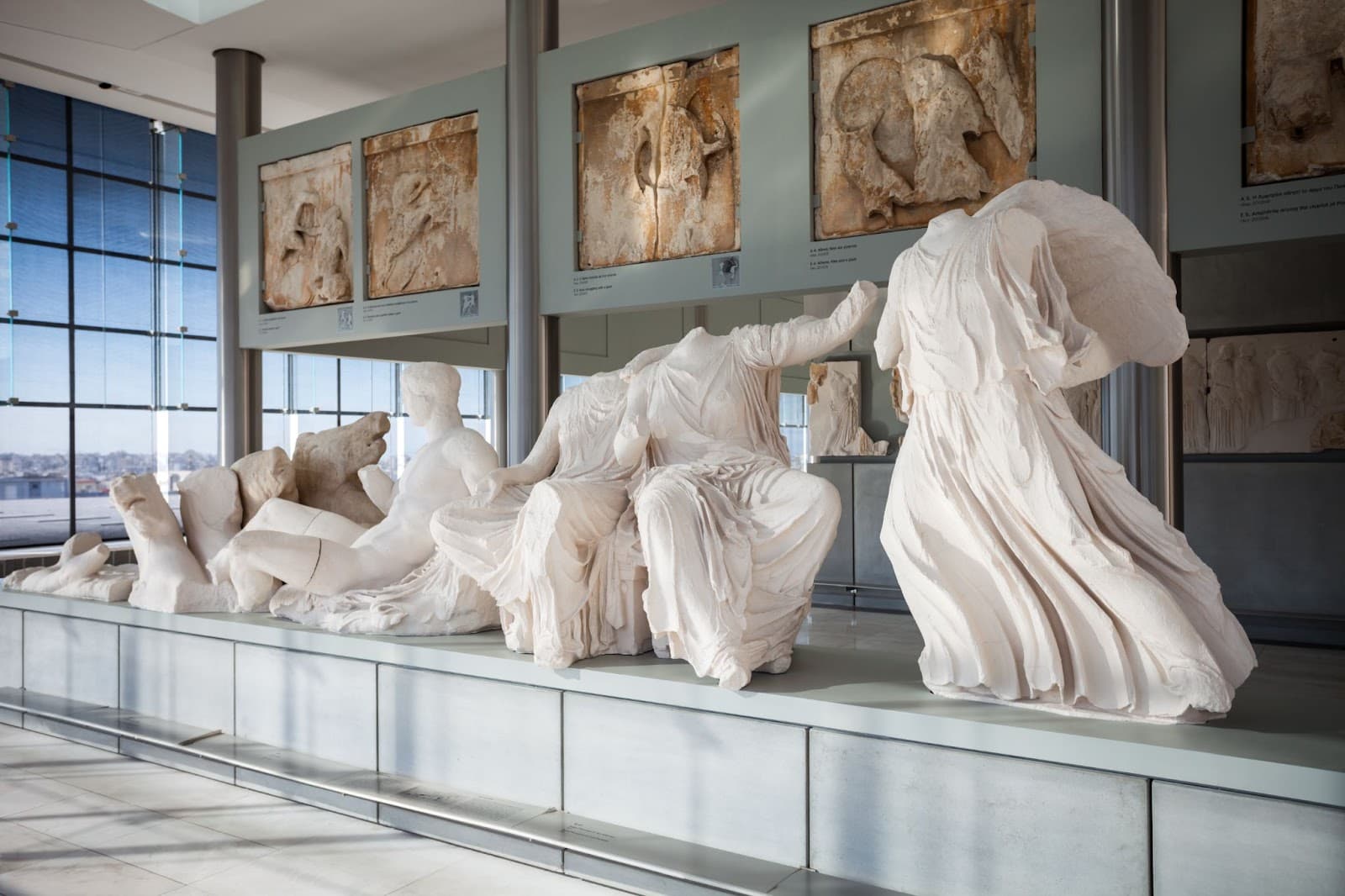Inside of the acropolis museum in Athens with marble statues
